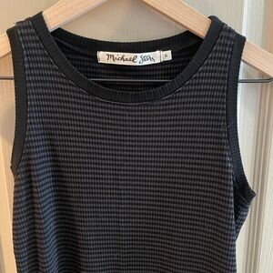 Michael stars asymmetrical black dress